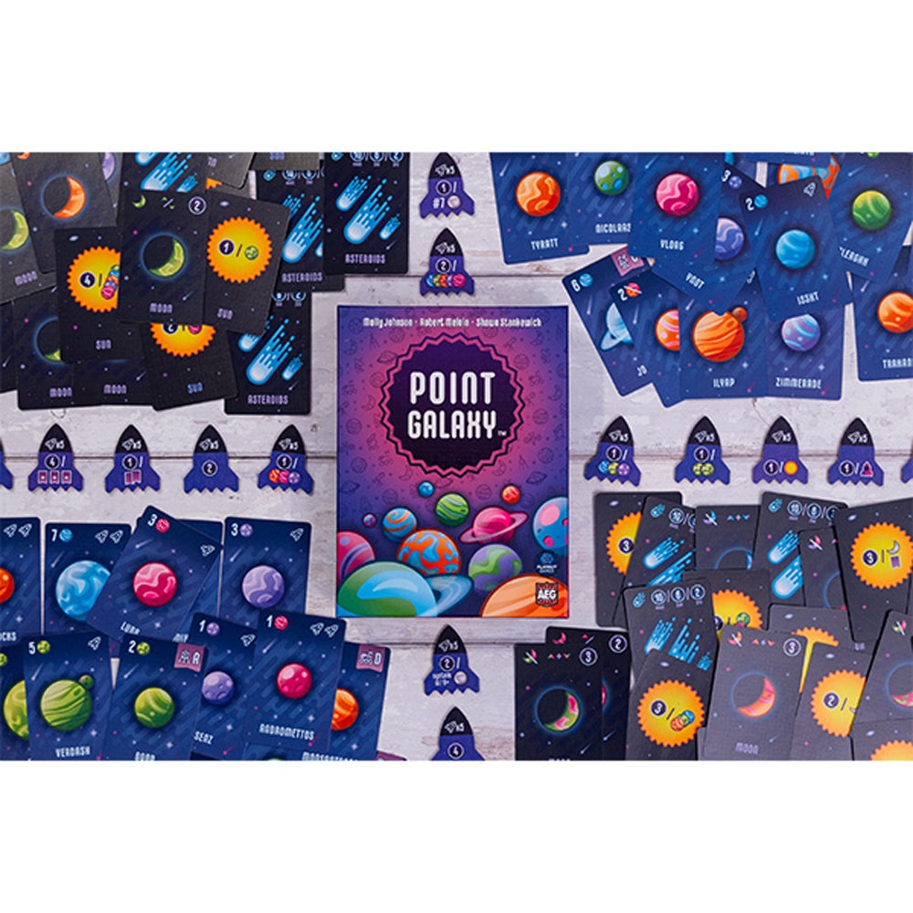 Point Galaxy box surrounded by planet cards, space cards, and rocket tokens.