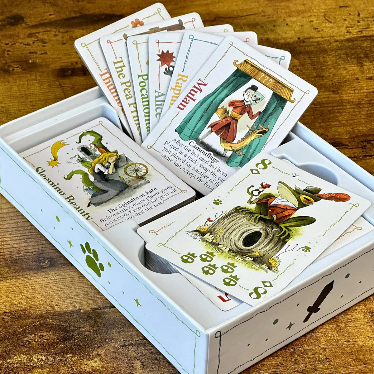 Rebel Princess Deluxe Edition cards and Frog Prince artwork displayed in the box insert.