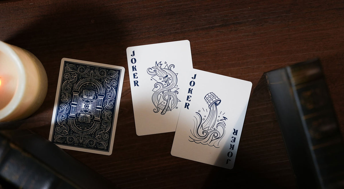 Broom and overflowing-water Joker artwork used in Sorcerer’s Apprentice Holographic Gilded playing cards.