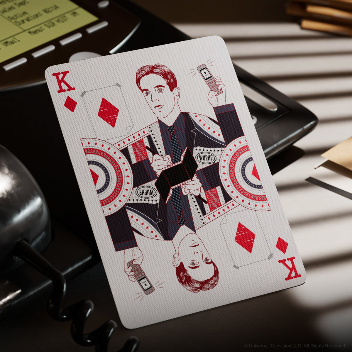 Ryan Howard illustrated on The Office Playing Cards King of Diamonds with a phone and WUPHF details