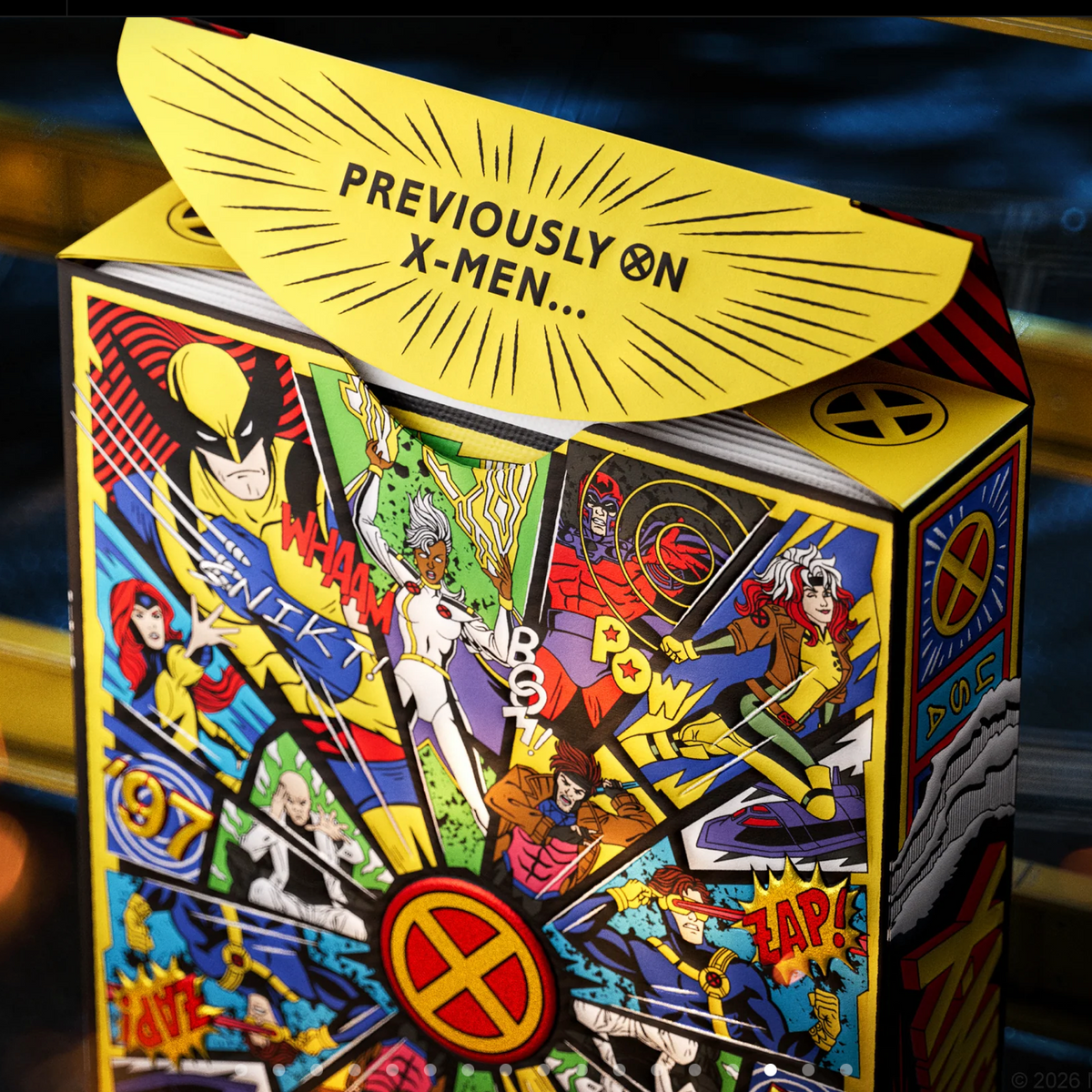 Open theory11 X-Men tuck box revealing a yellow interior flap printed with Previously on X-Men above the illustrated rear panel.