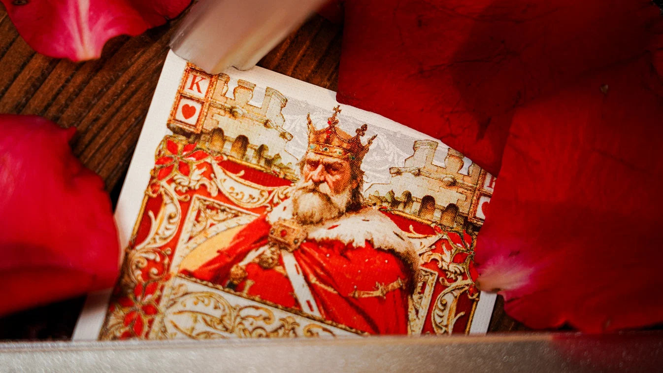 Fortress King of Hearts wearing red royal robes against castle artwork