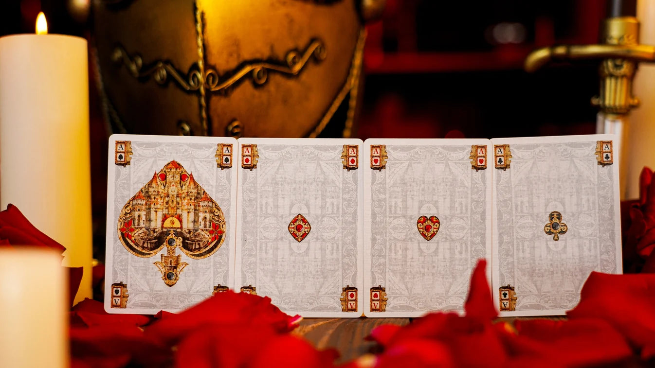 Four custom Aces from Fortress Playing Cards including the castle Ace of Spades