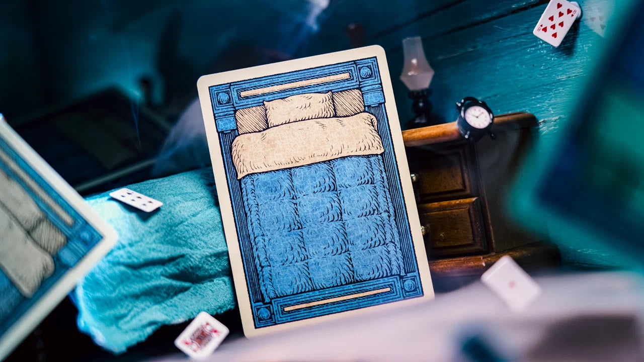 One-way Sleep Walk playing card back depicting a blue bed with pillows and blanket