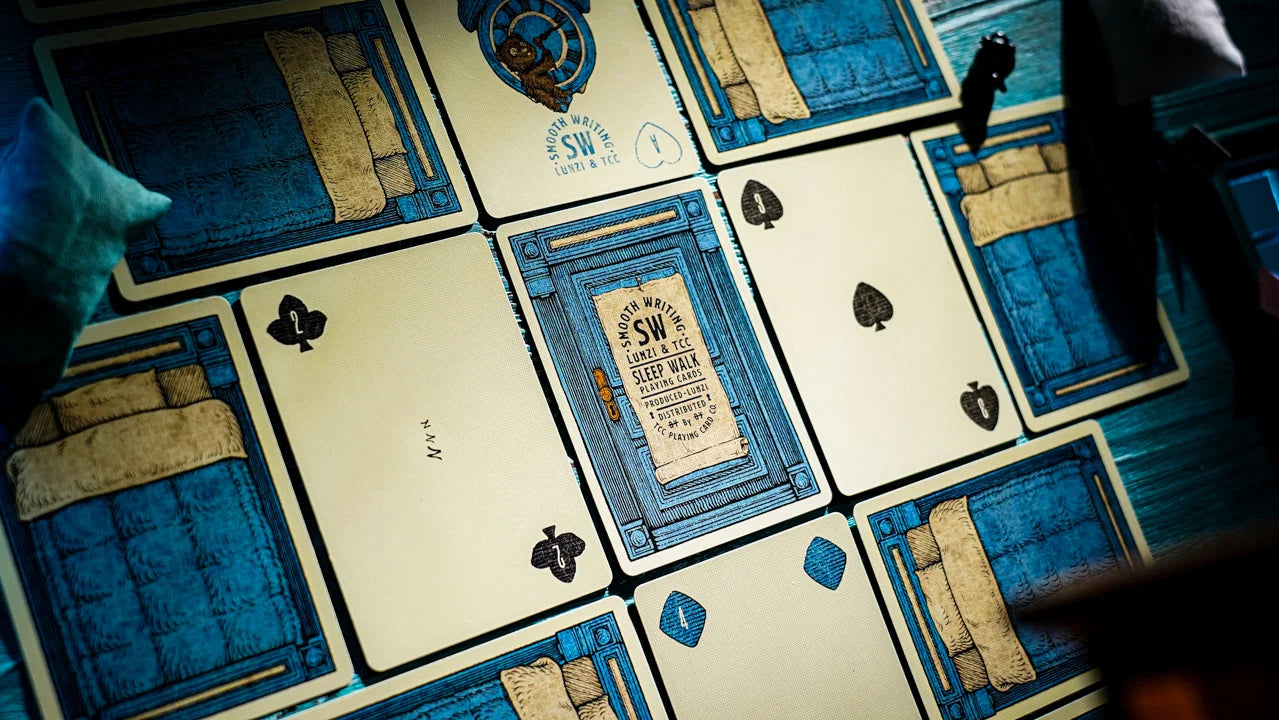 Sleep Walk Playing Cards arranged to show custom Aces bed backs and tuck artwork