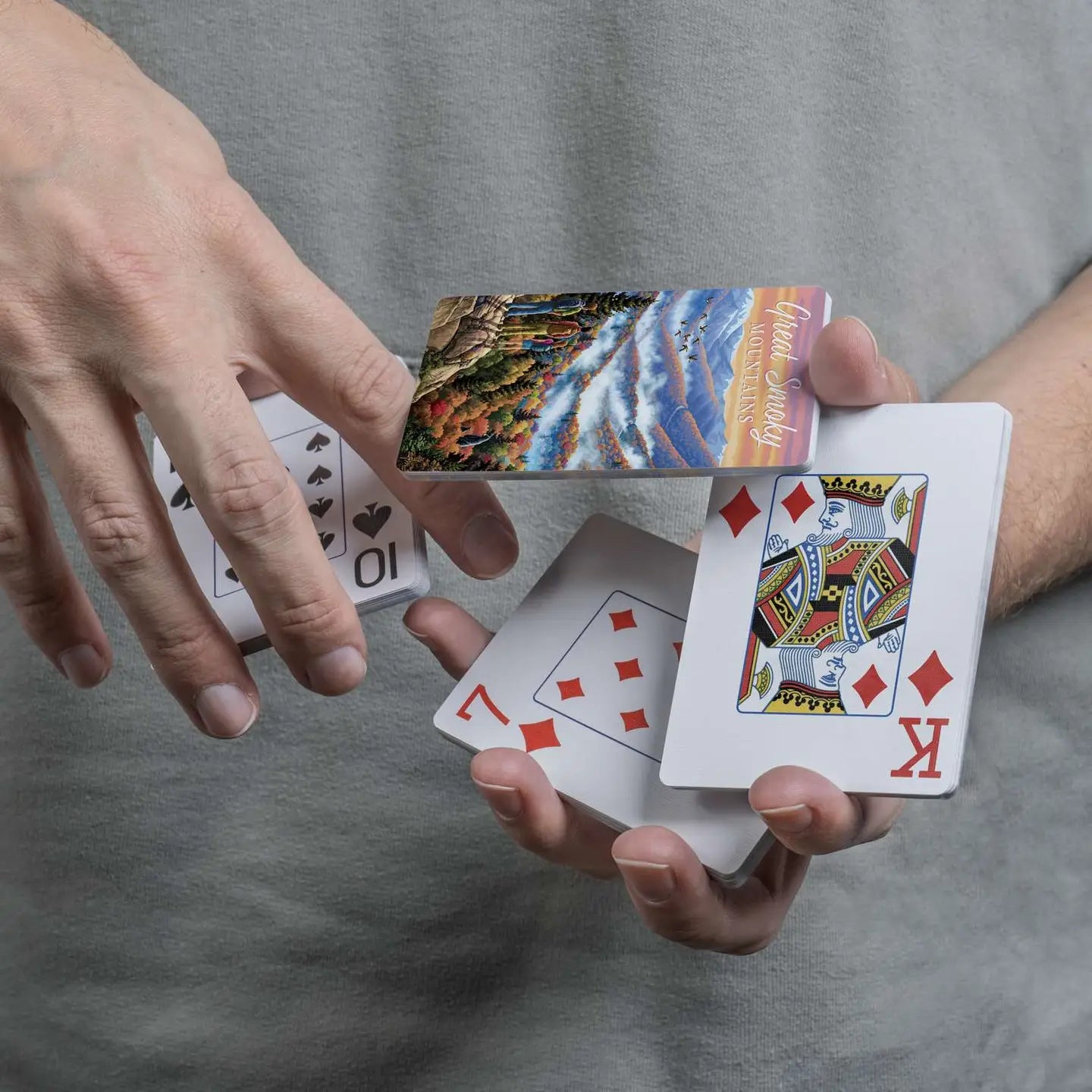 Great Smoky Mountains playing cards displayed in a cascading spring