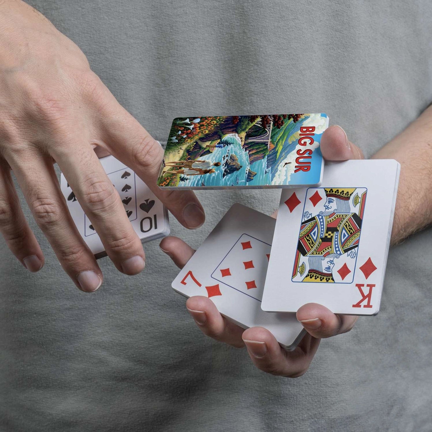 Close-up of Big Sur card back and traditional playing-card faces