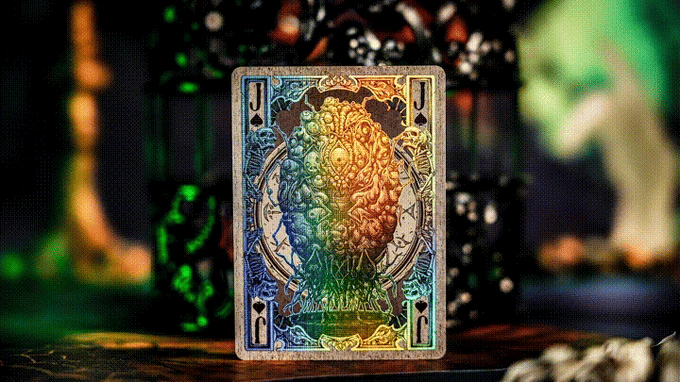 Colorful Keyhole Luxury Edition playing card with a dragon design on a blurred background