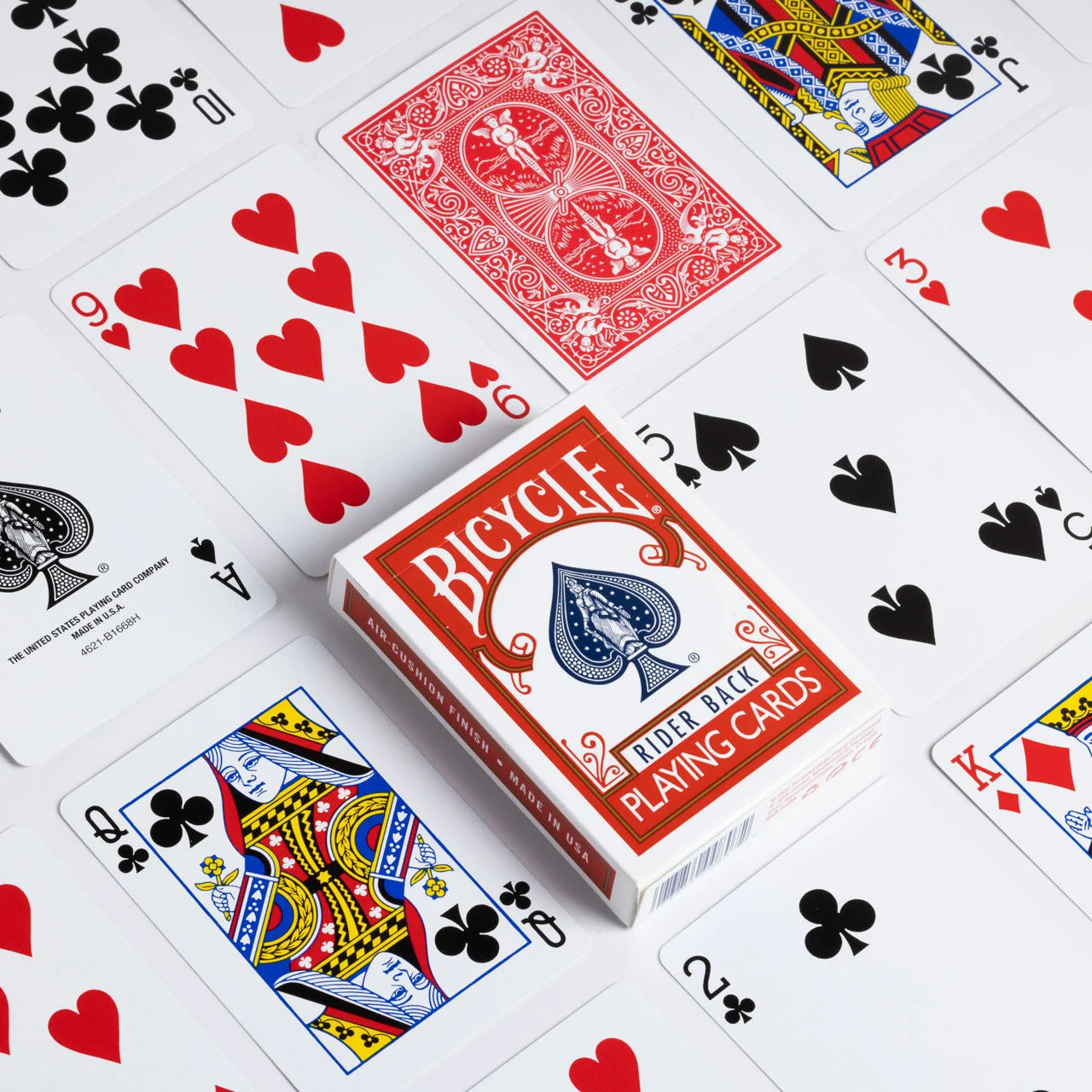 Bicycle rider back playing cards with various card faces displayed on a white background