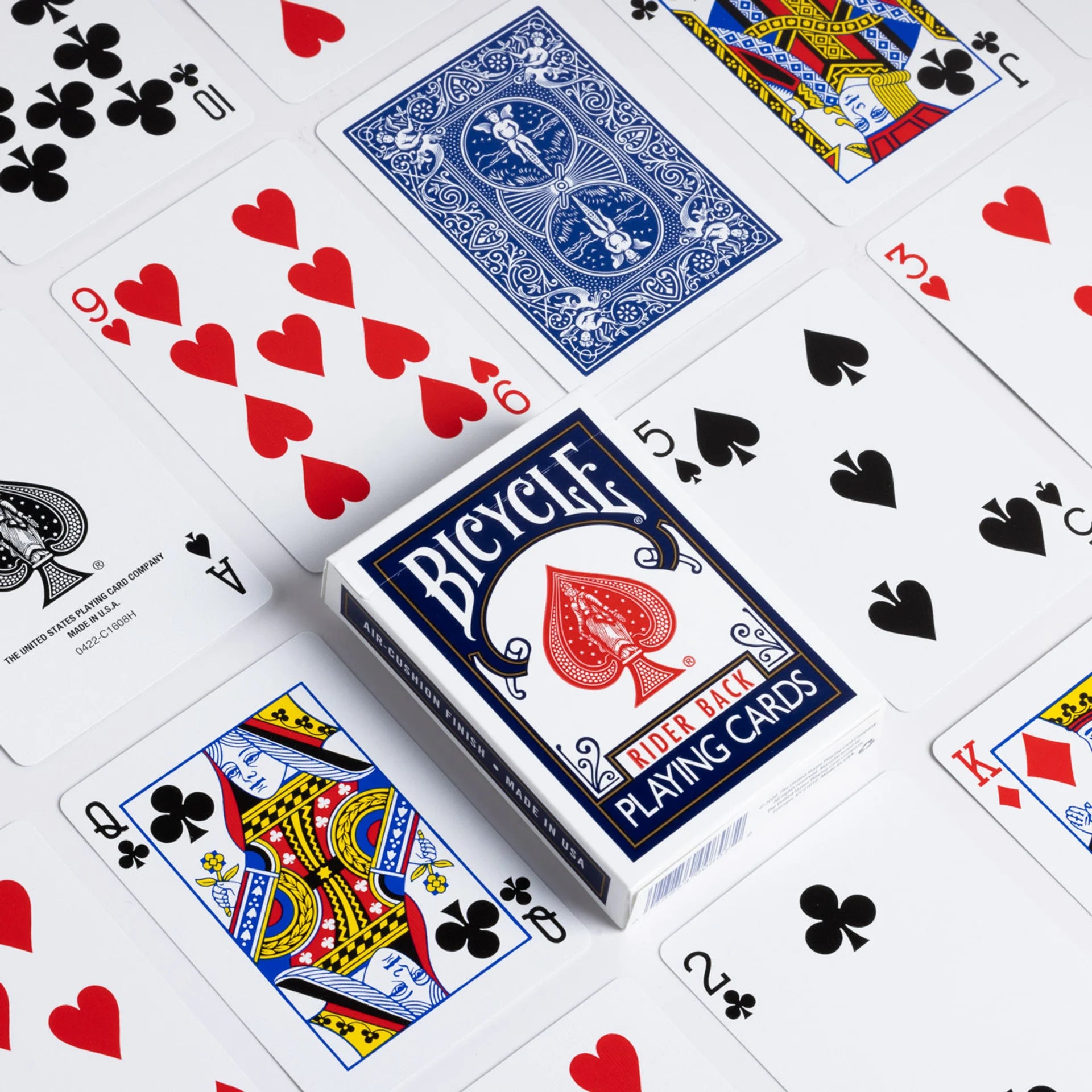 Bicycle rider back playing cards with various card faces displayed on a white background