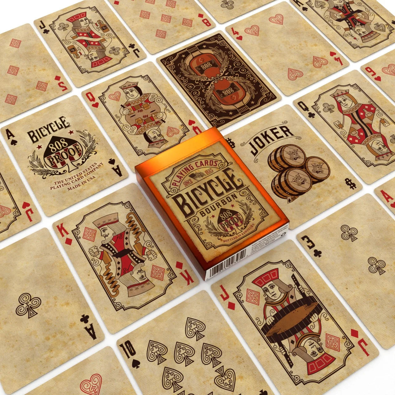 Bicycle Bourbon cards spread out, showing aged parchment faces, custom jokers with barrels, and 808 bourbon bottle backs around tuck box.