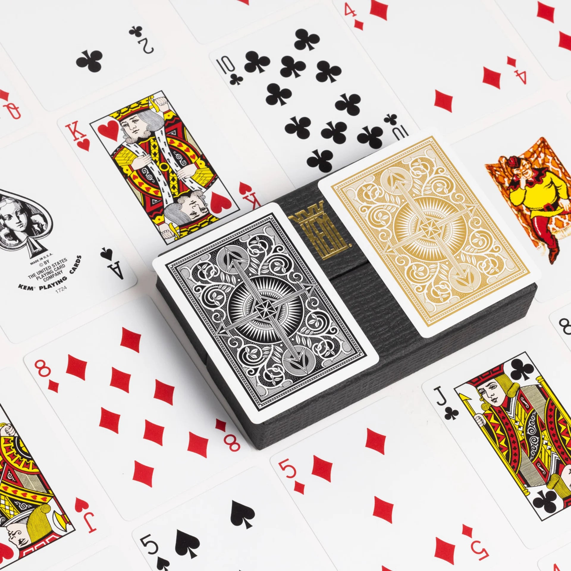 KEM Playing cards with various cards displayed on a white background