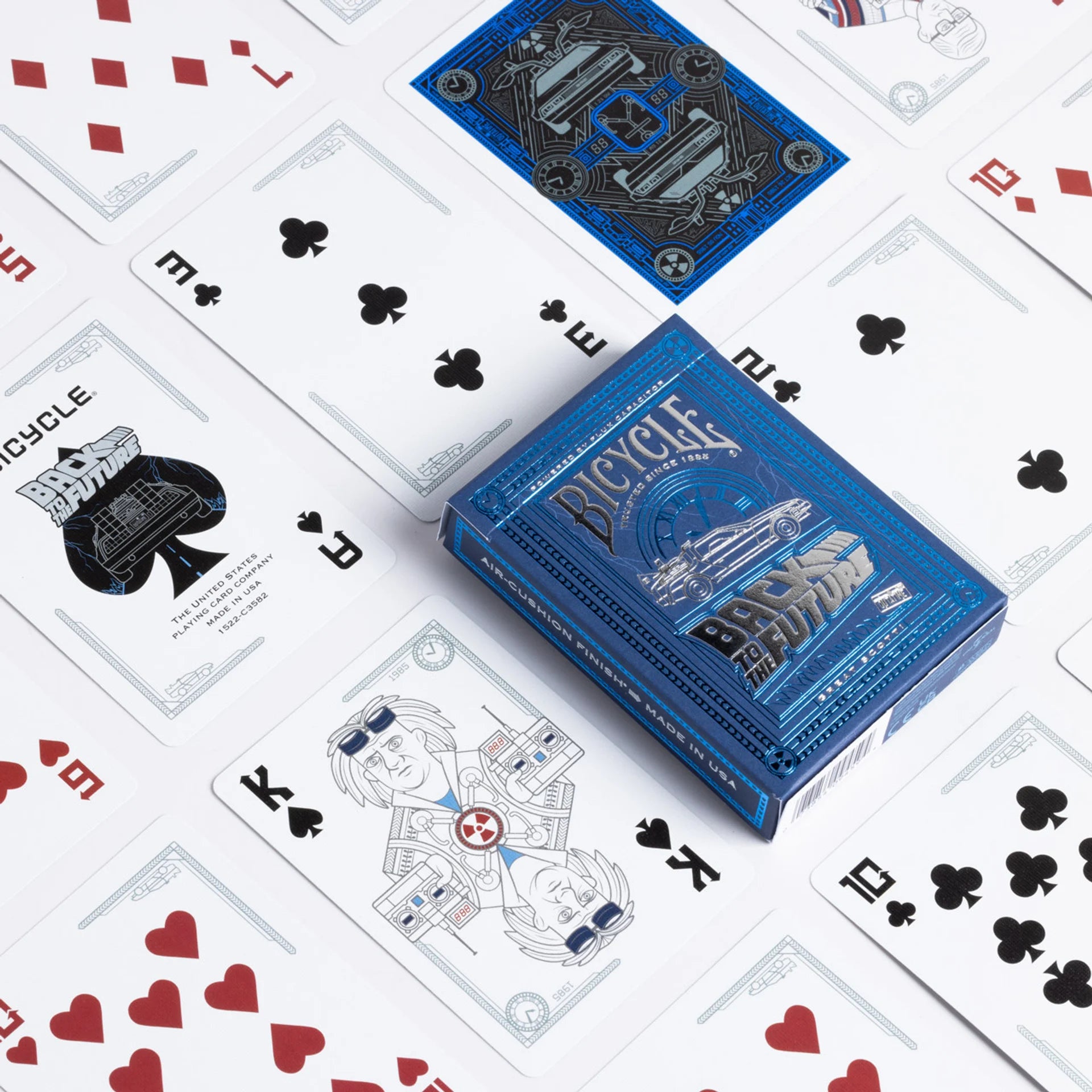 Blue Bicycle Back to the Future playing card box on a white background with cards