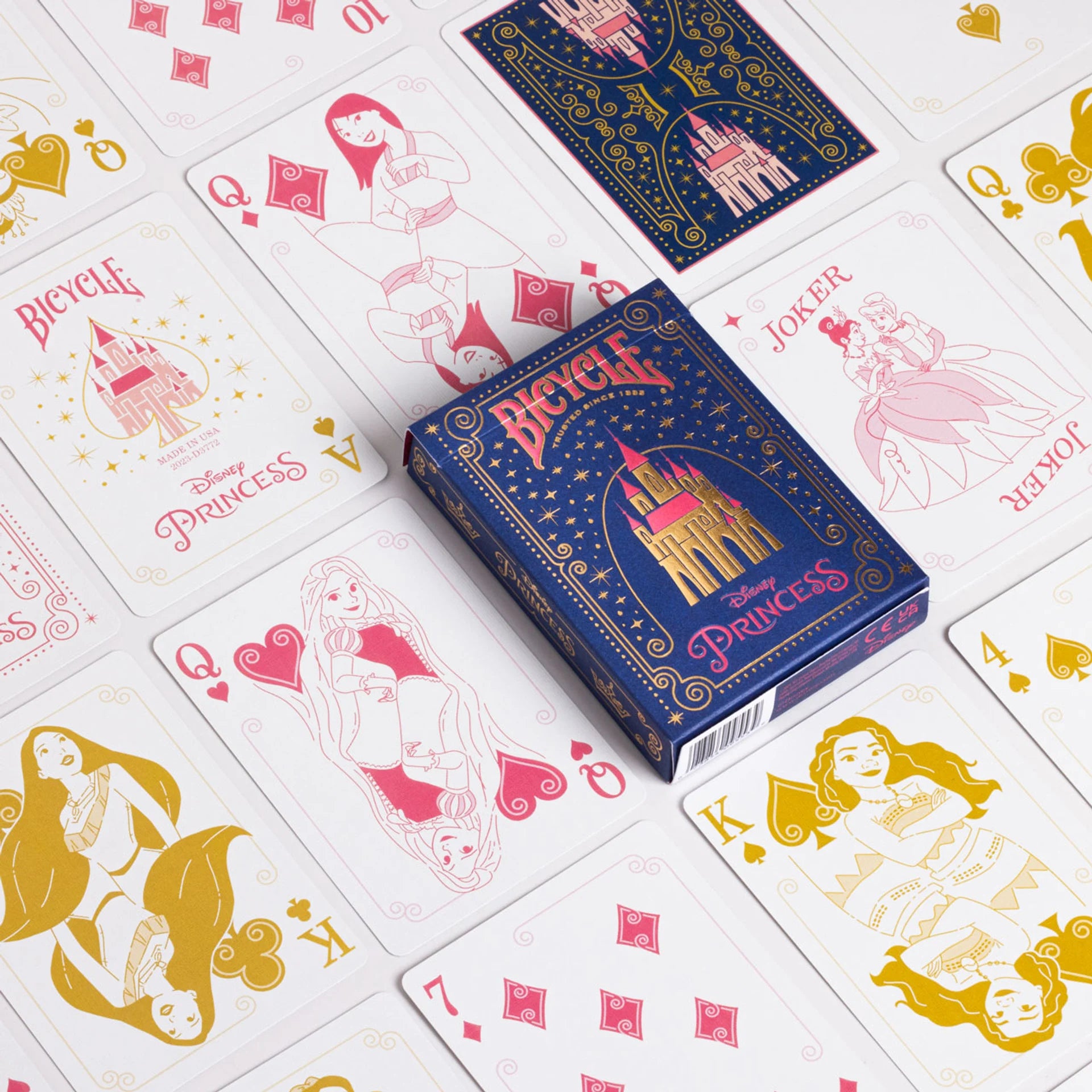 Playing cards with Disney Princess design on a white background