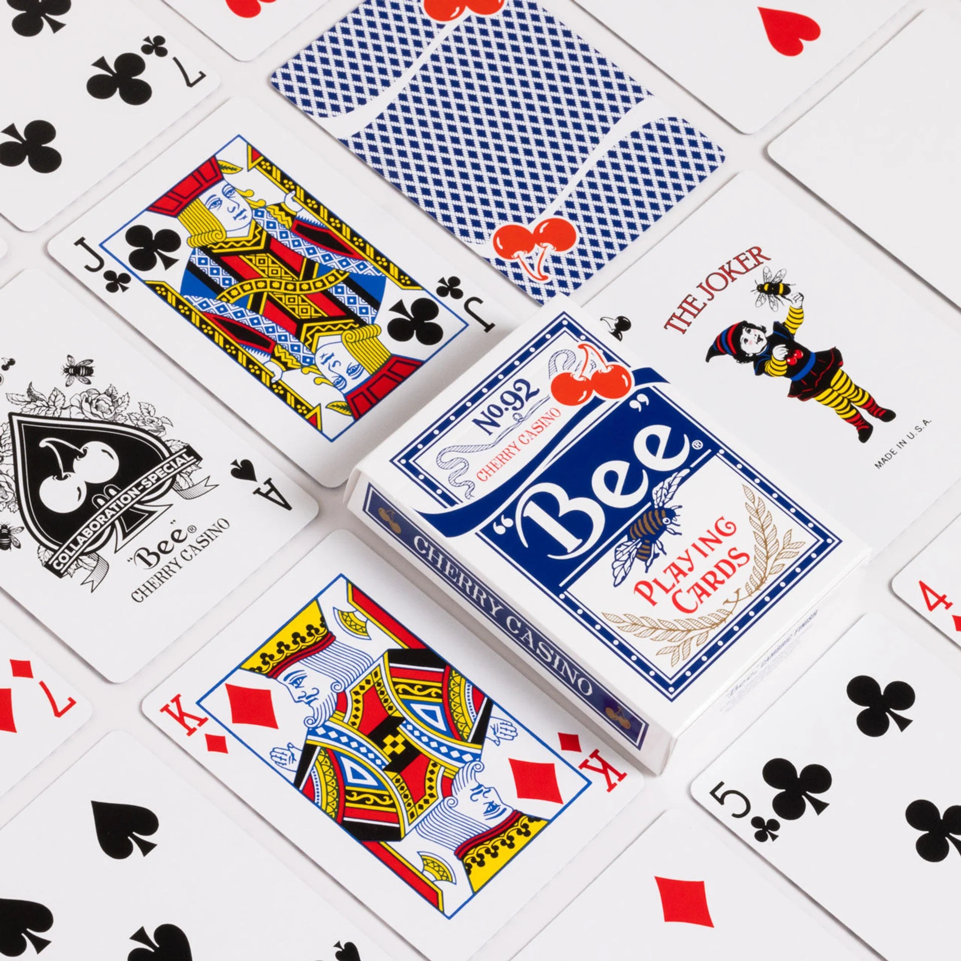 Playing cards with visible branding on a white background
