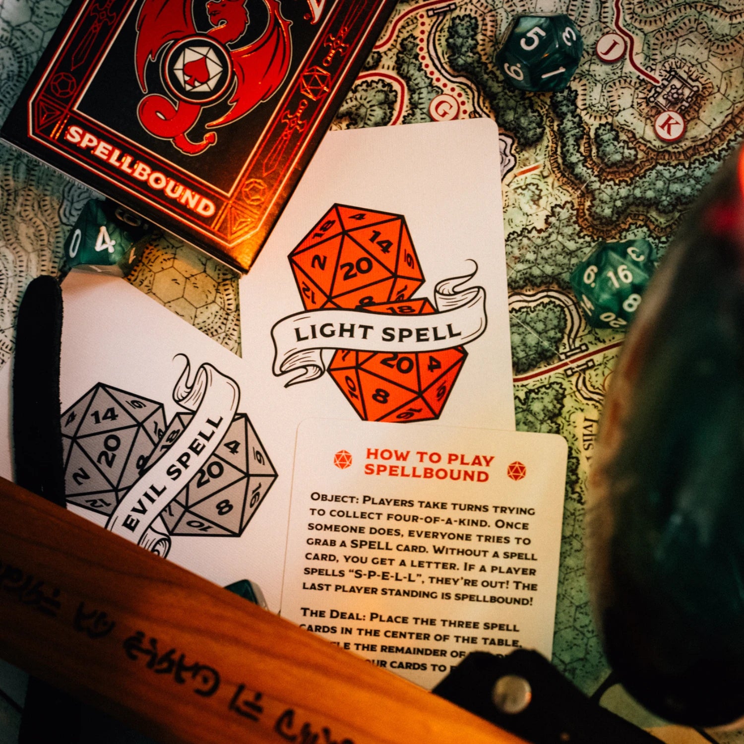 Bicycle Spellbound spell cards and rules card with tabletop game dice