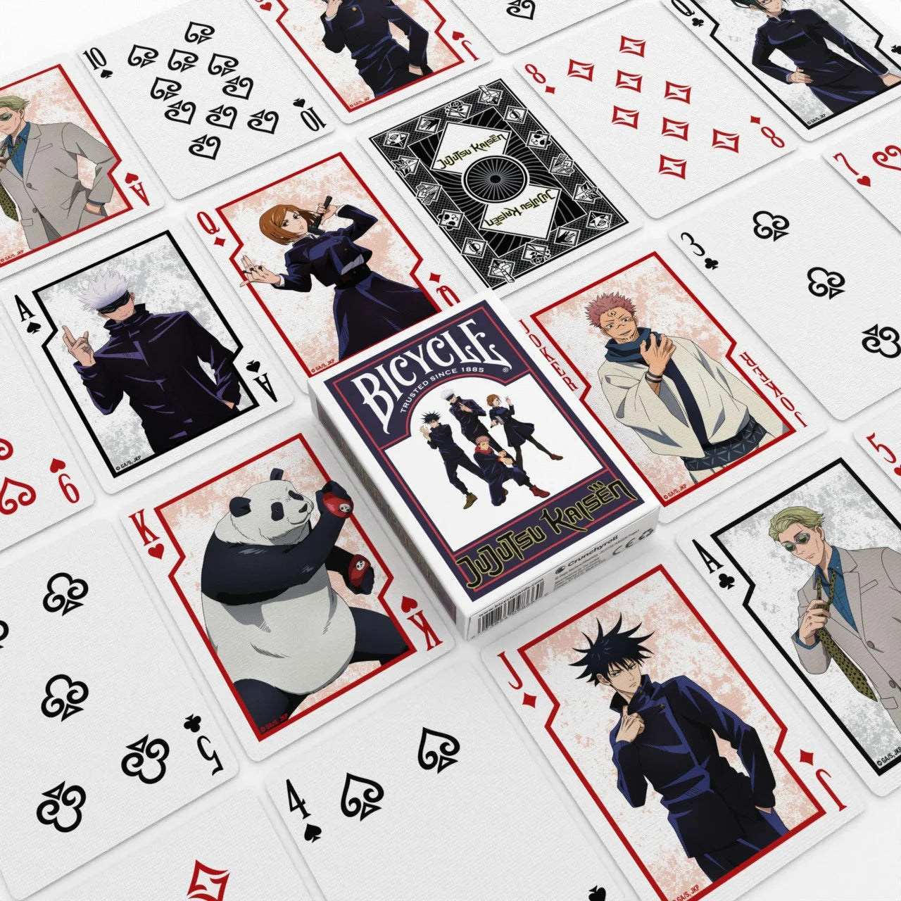 Bicycle Jujutsu Kaisen playing cards spread out, showing anime character courts and custom Jujutsu Kaisen tuck box in the center.