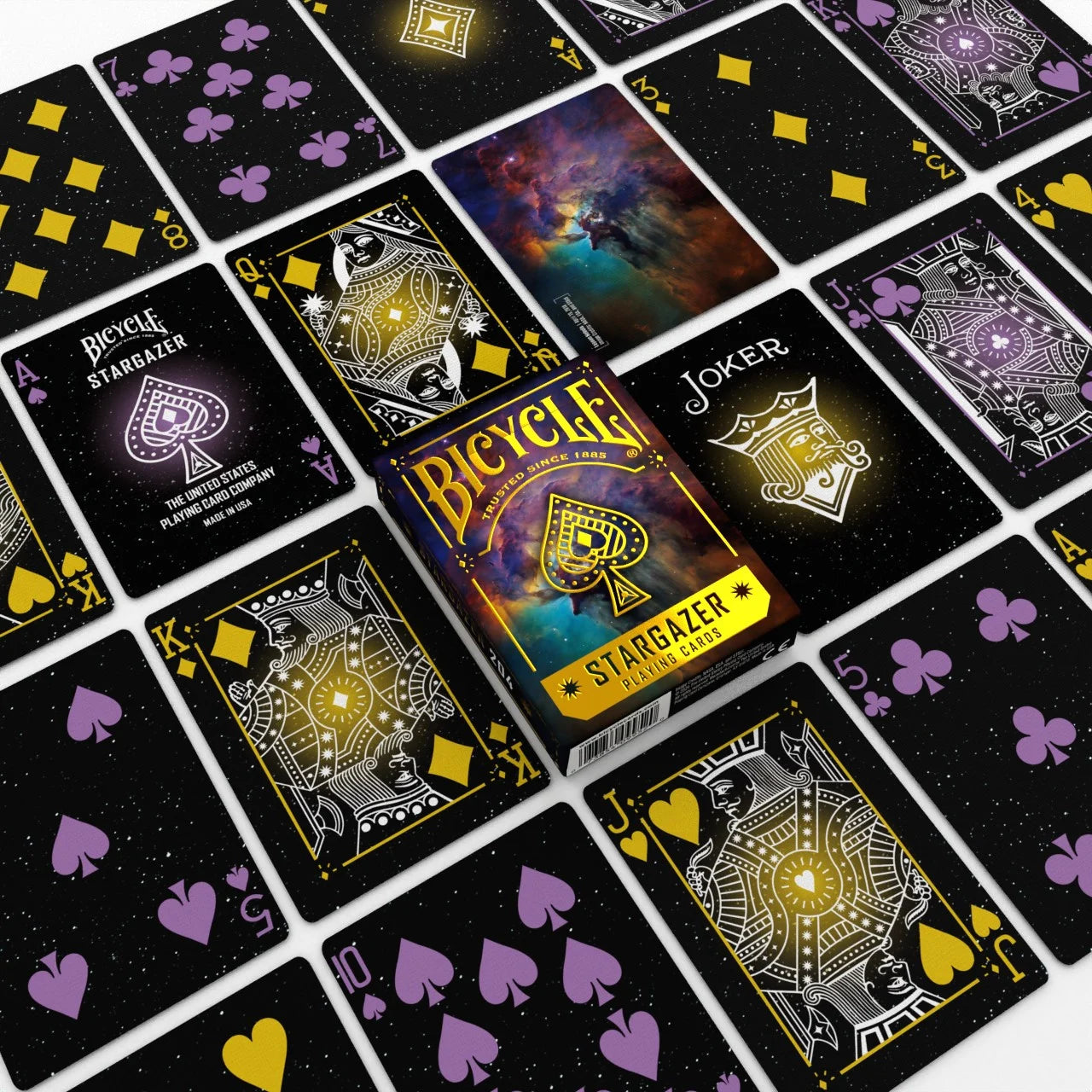 Bicycle Stargazer 204 playing cards spread with cosmic card faces and tuck box