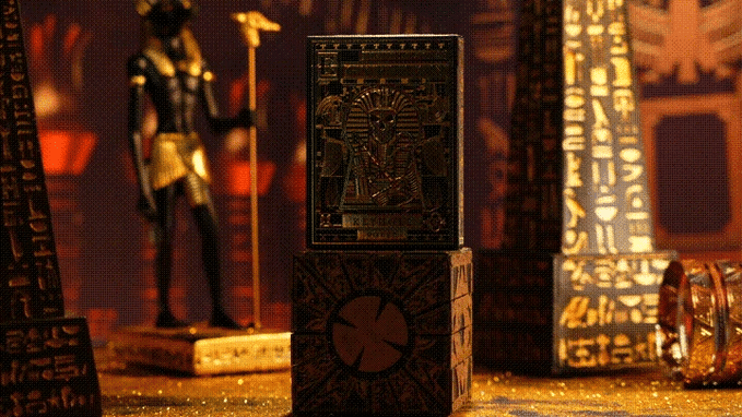 Decorative boxes with intricate designs in a warm, glowing setting