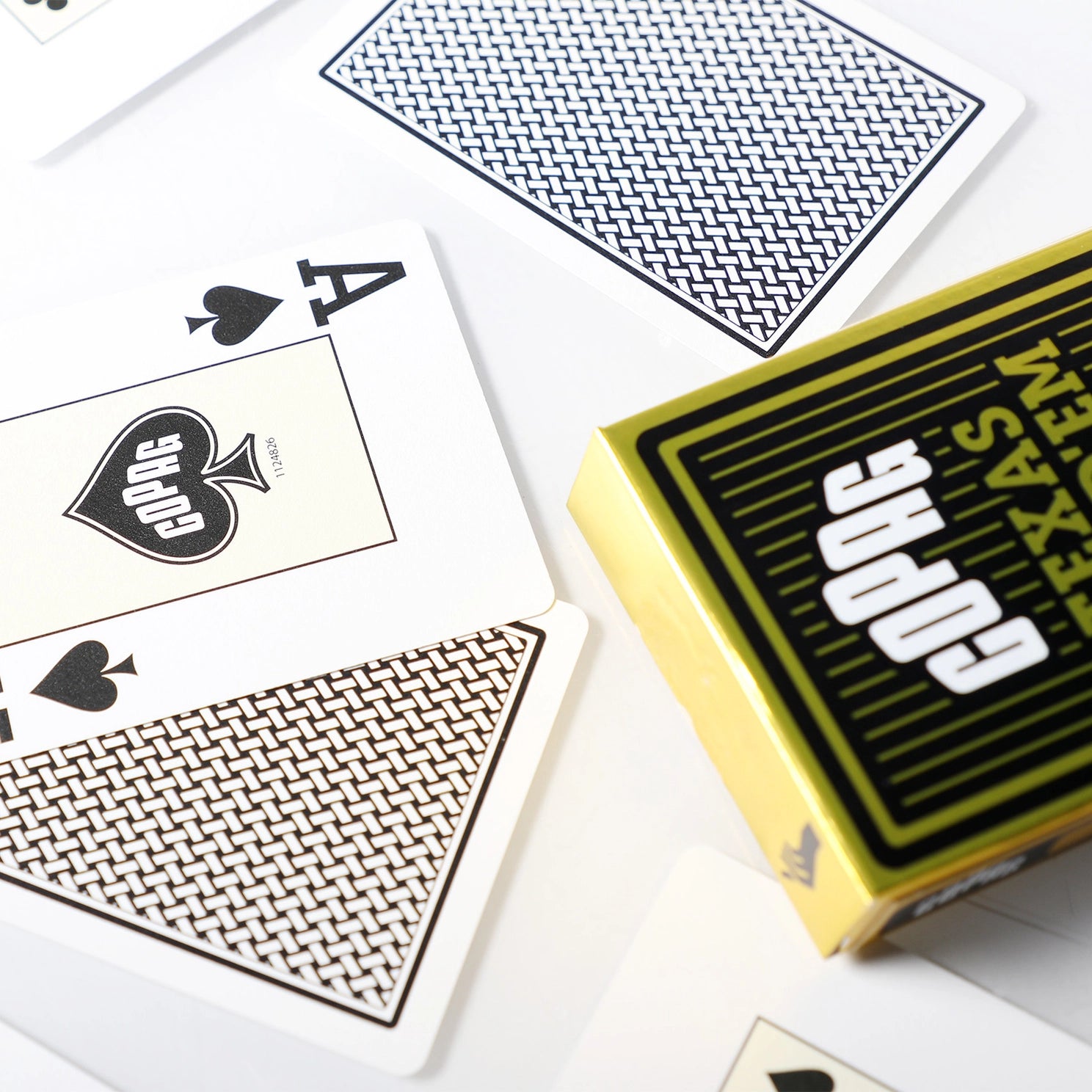 Playing cards with Copag brand name on a white background