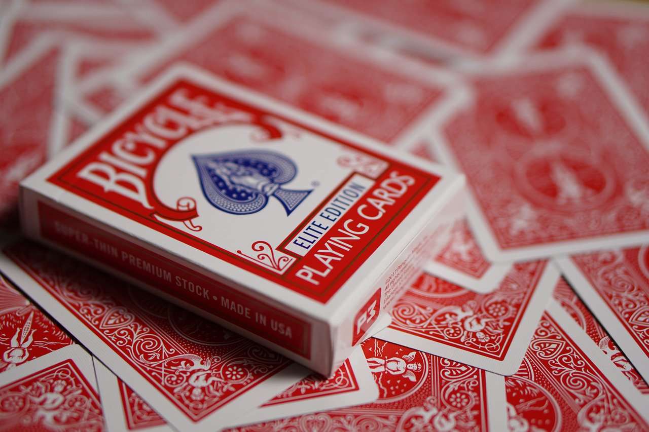 Bicycle playing cards with a red and white design