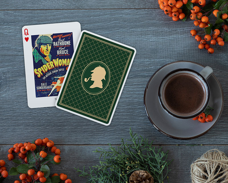 Sherlock Holmes collector playing cards by Piatnik spread across table