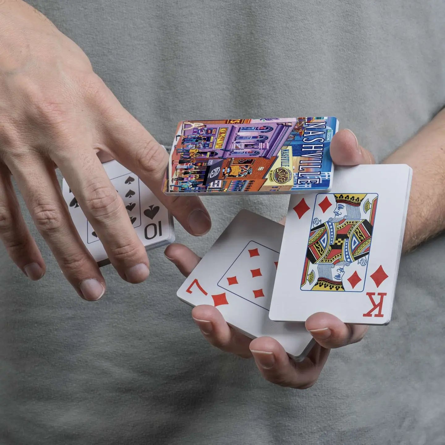Nashville Music City playing cards displayed in a cascading spring