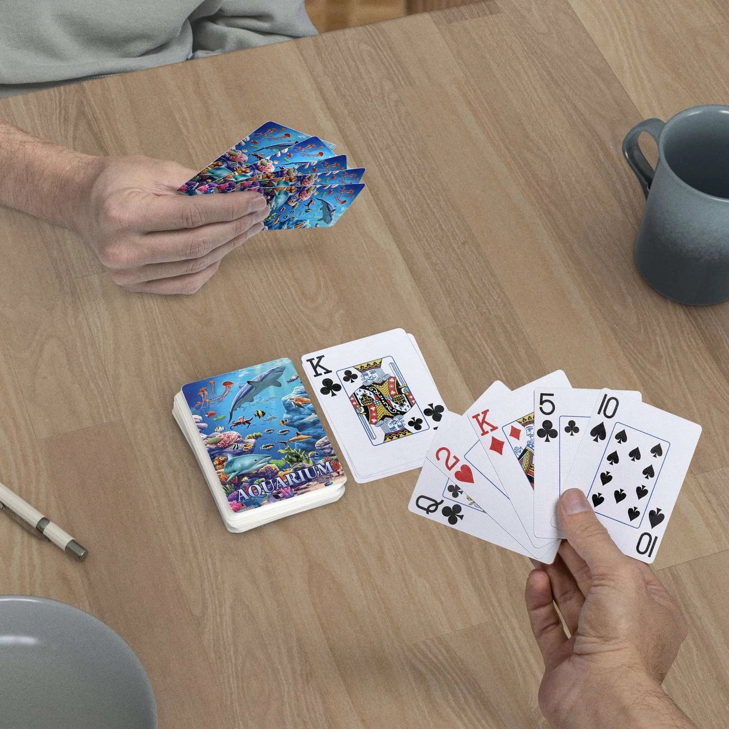 Boardwalk Aquarium Playing Cards used in a casual card game