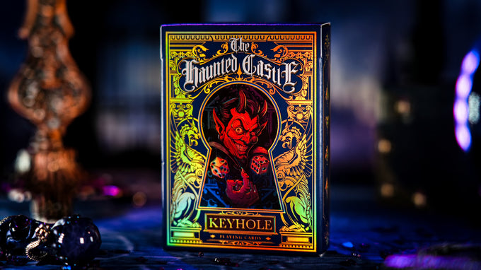 Colorful packaging of 'The Haunted Castle Keyhole' with a dark, mystical background.