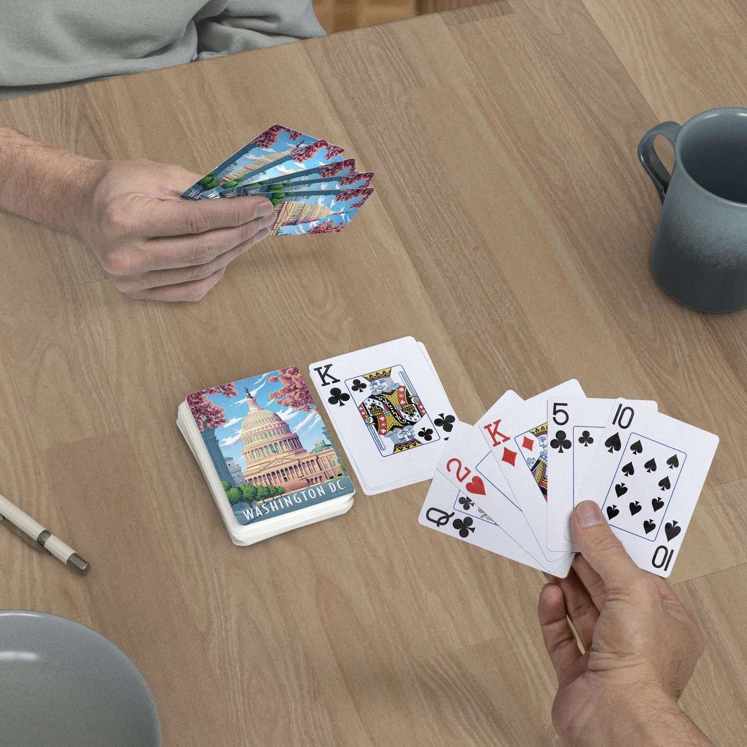 Washington D.C. jumbo-index playing cards in use at a card table with Capitol scenic back design