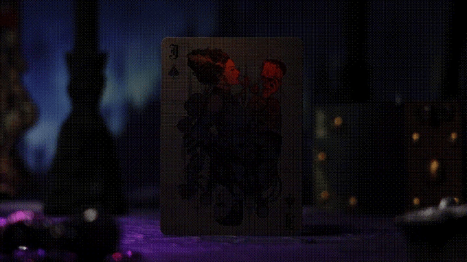 Keyhole Luxury Edition playing card with a black spade symbol on a dark background