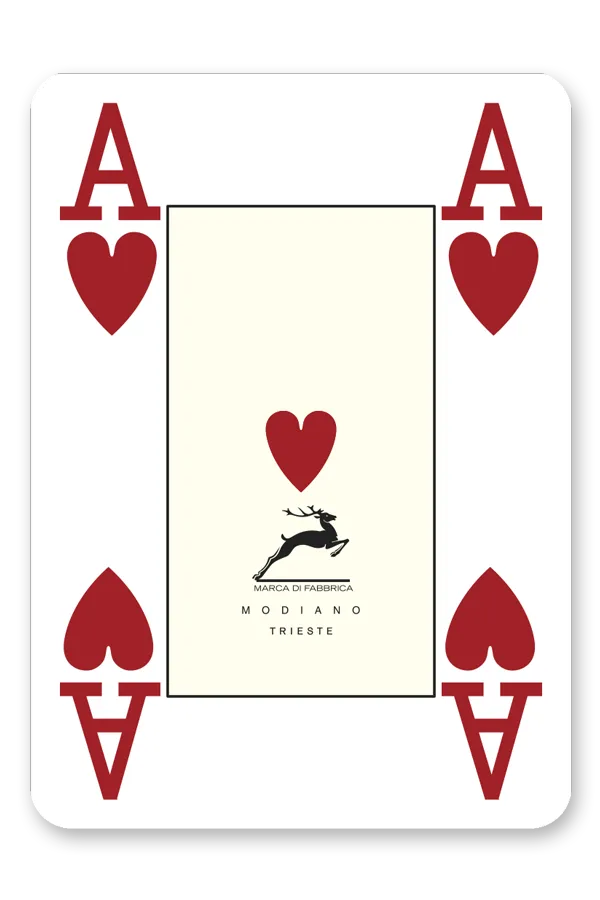 Playing card with red hearts and 'Modiano' branding on a white background