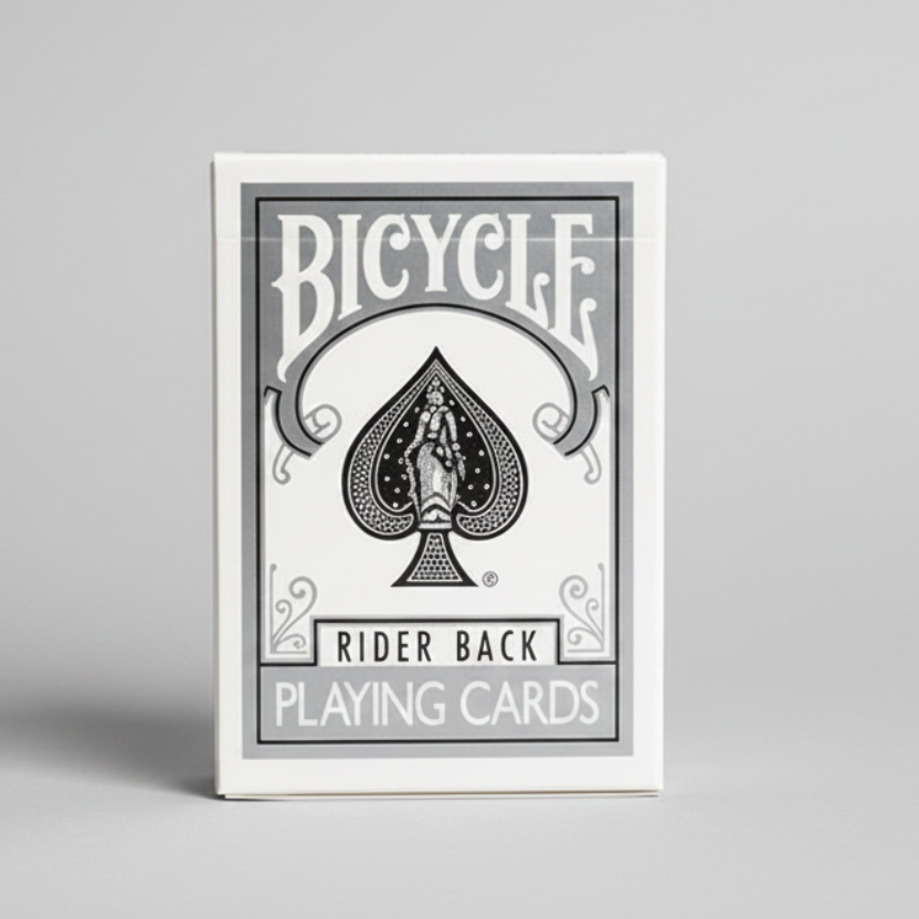 Bicycle Silver Rider Back Playing Cards specialty color deck with silver tuck box in front of other Bicycle color decks