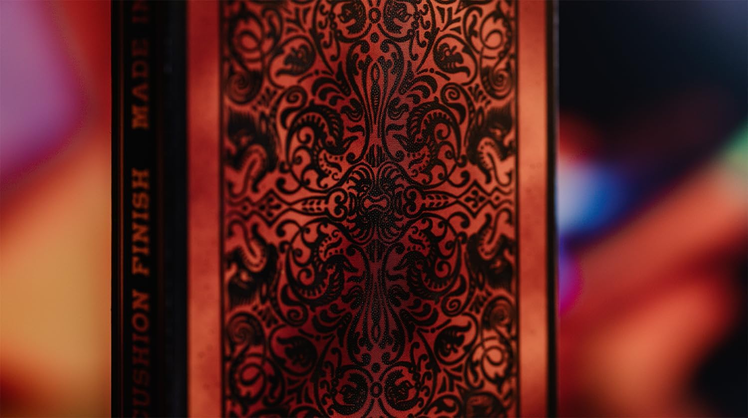 Decorative wooden panel with intricate black patterns on a blurred background