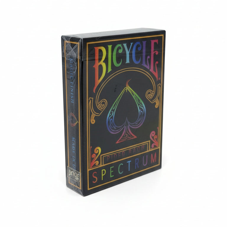 Packaged Bicycle Spectrum playing cards with colorful design on a black background