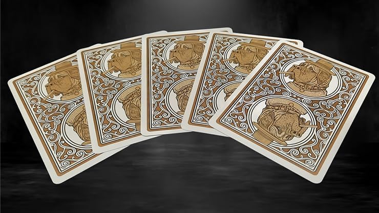 Set of playing cards with decorative designs on a dark background