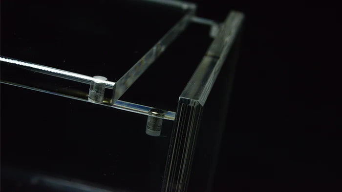 Close-up of Carat X12 acrylic case recessed lid and neodymium magnetic closure