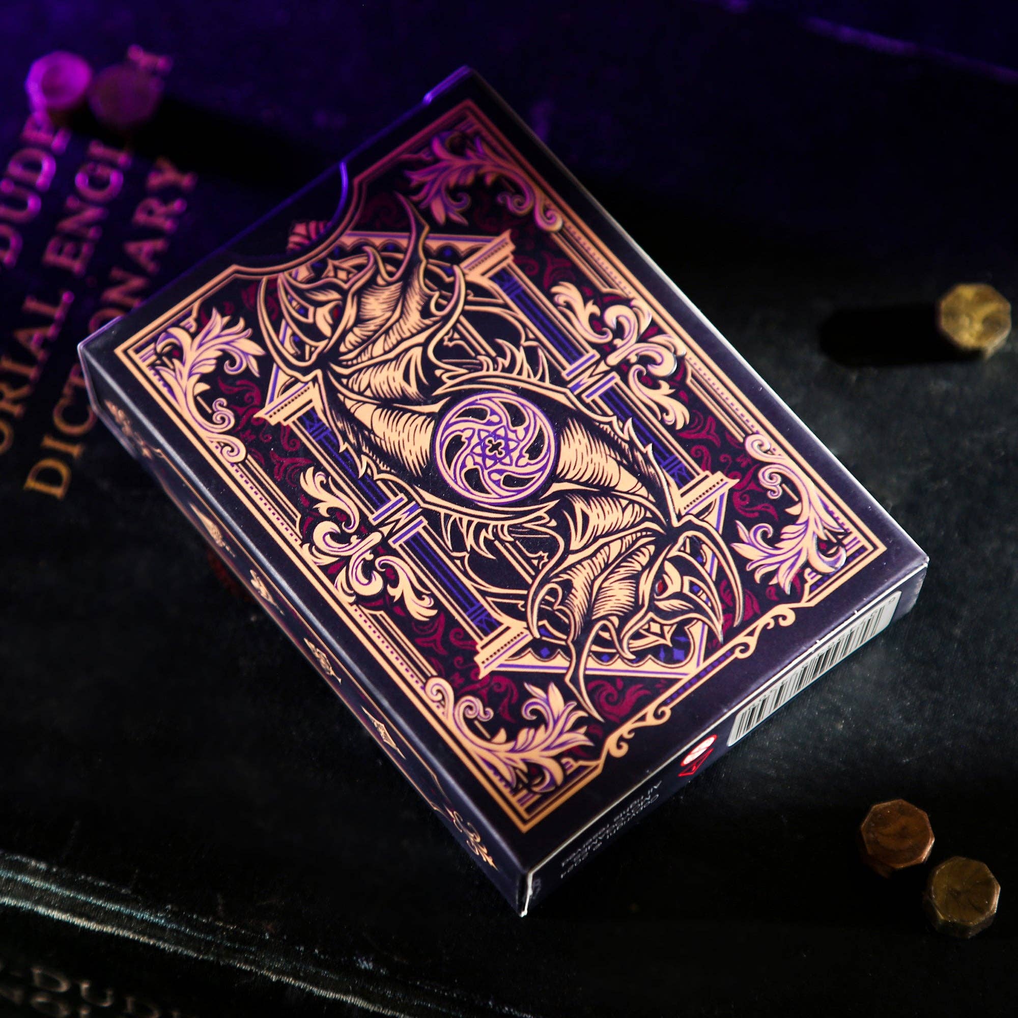 Decorative deck of cards with intricate designs on a dark background