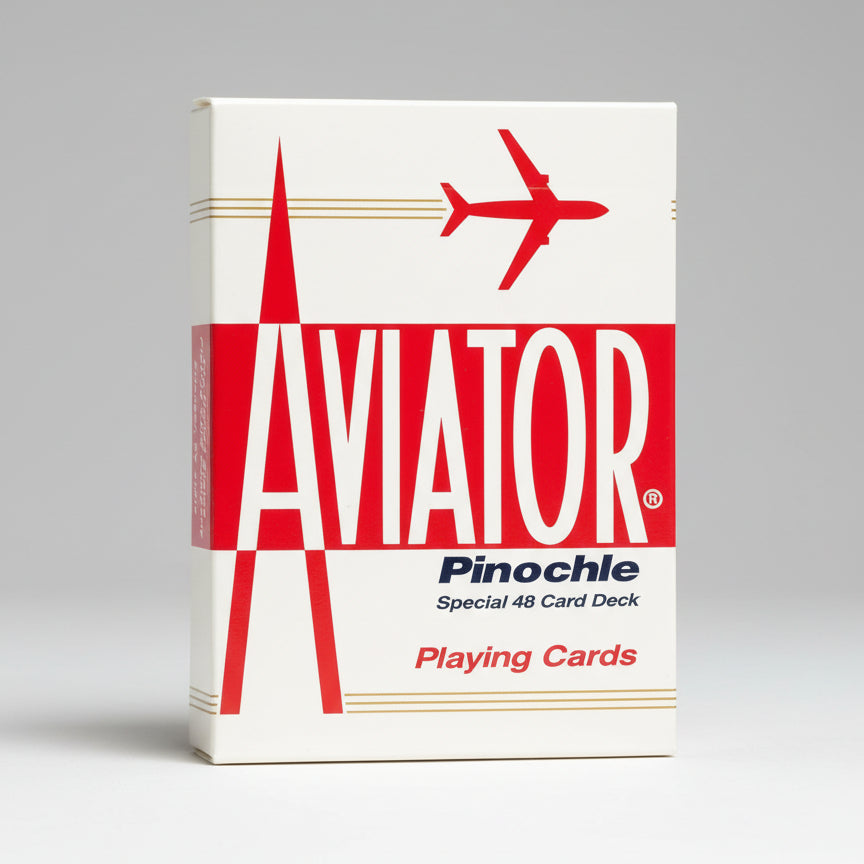 Aviator Pinochle playing cards packaging with red airplane logo on a white background