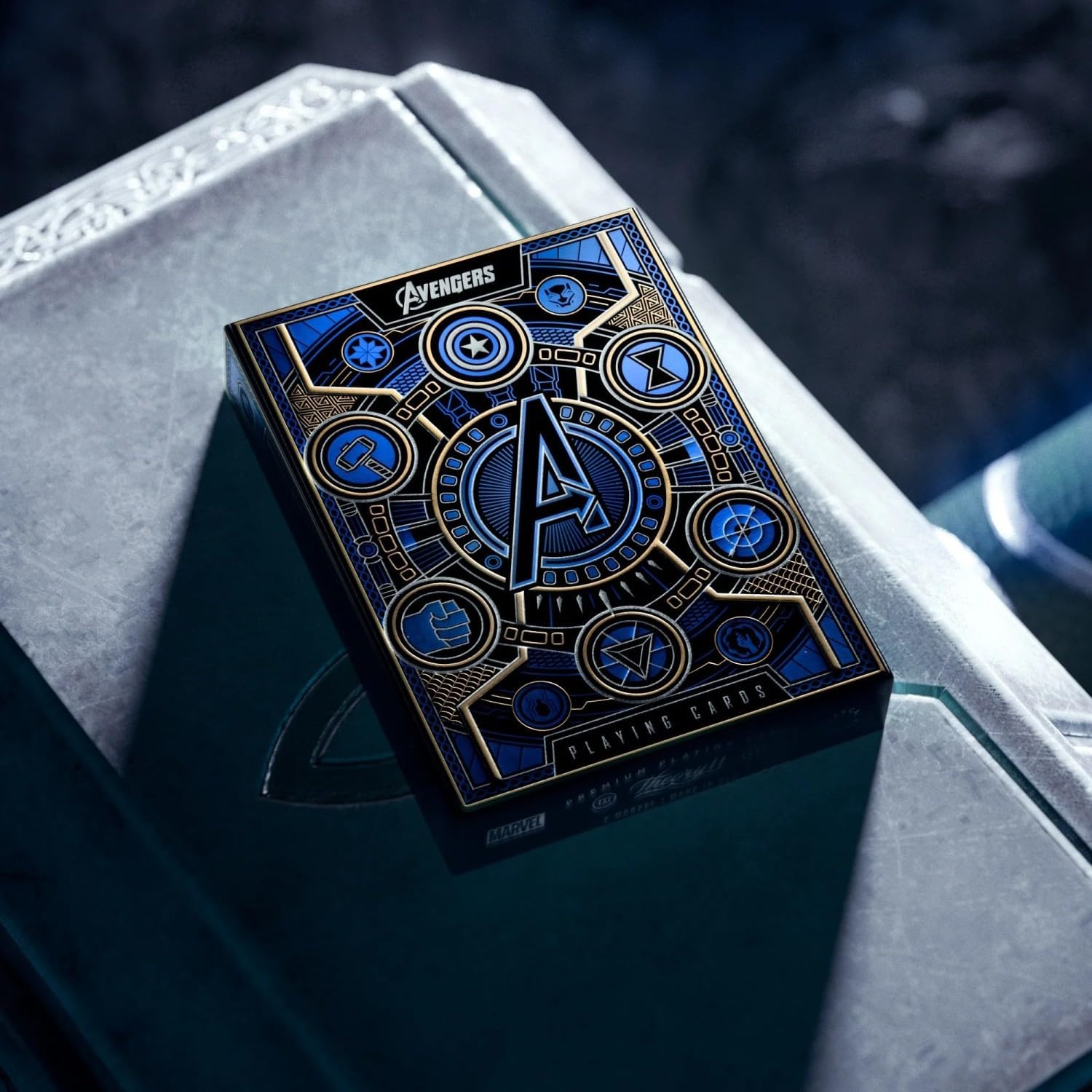 Avengers-themed playing card set on a reflective surface