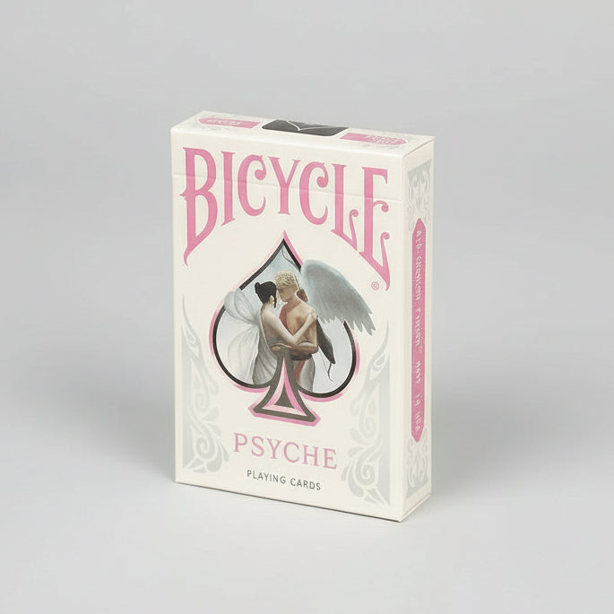Boxes of Bicycle Psyche playing cards on a white background.