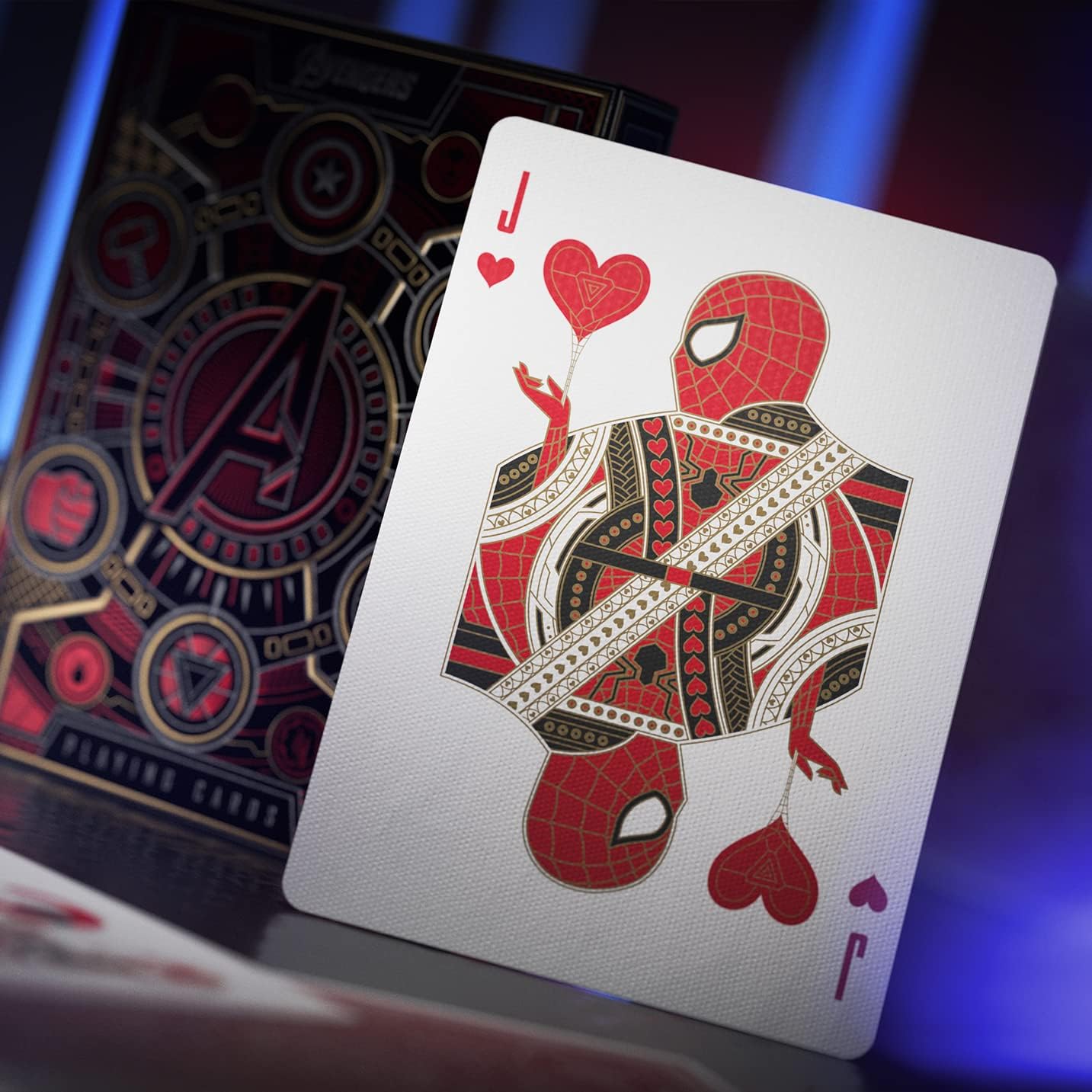 Playing card with a unique design featuring hearts and a stylized figure on a dark background.