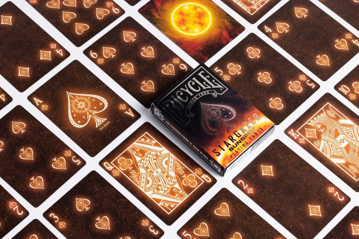 Pack of Bicycle playing cards with glowing card designs on a matching card background