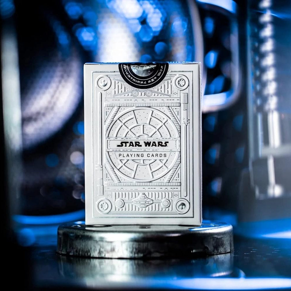 Star Wars playing cards in a metallic holder with a blue light effect