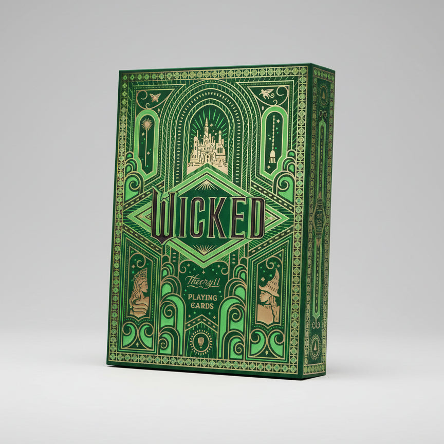 Green and gold 'Wicked' playing cards box with decorative patterns and text.