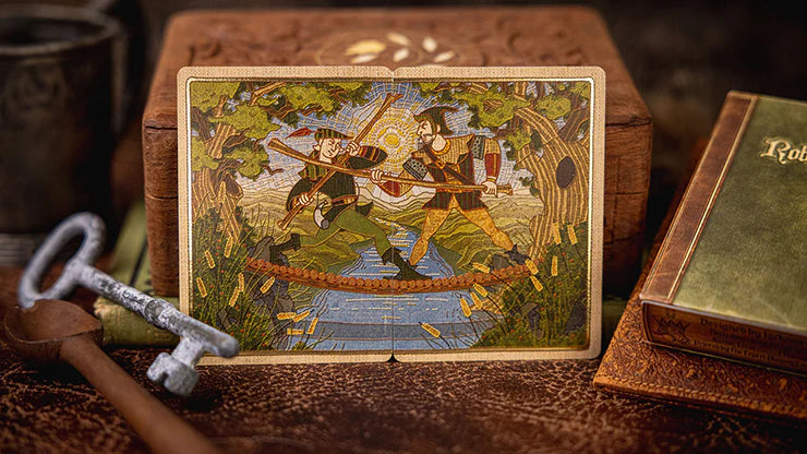 Decorative playing card with a fantasy scene on a wooden surface with a book and key.