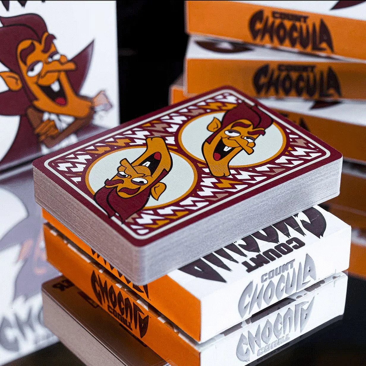 Stack of Count Chocula playing cards with a cartoon character on top