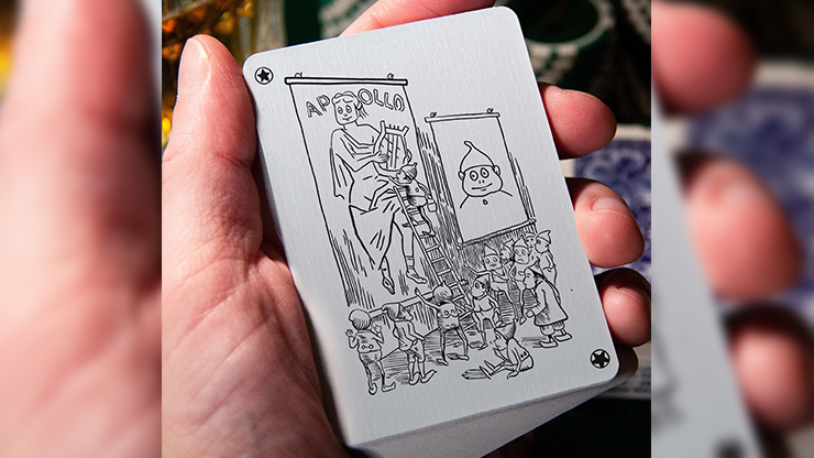 Hand holding a playing card with intricate design and text