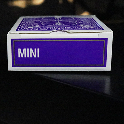 Bicycle Mini Playing Cards in purple and white box on a dark surface