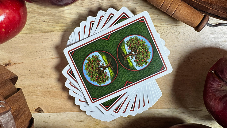 Johnny Appleseed playing cards with apple tree backs displayed in a fan